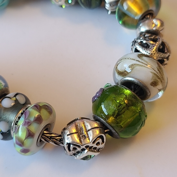 sterling silver charm bracelet full of charms marked 925 - Picture 3 of 4